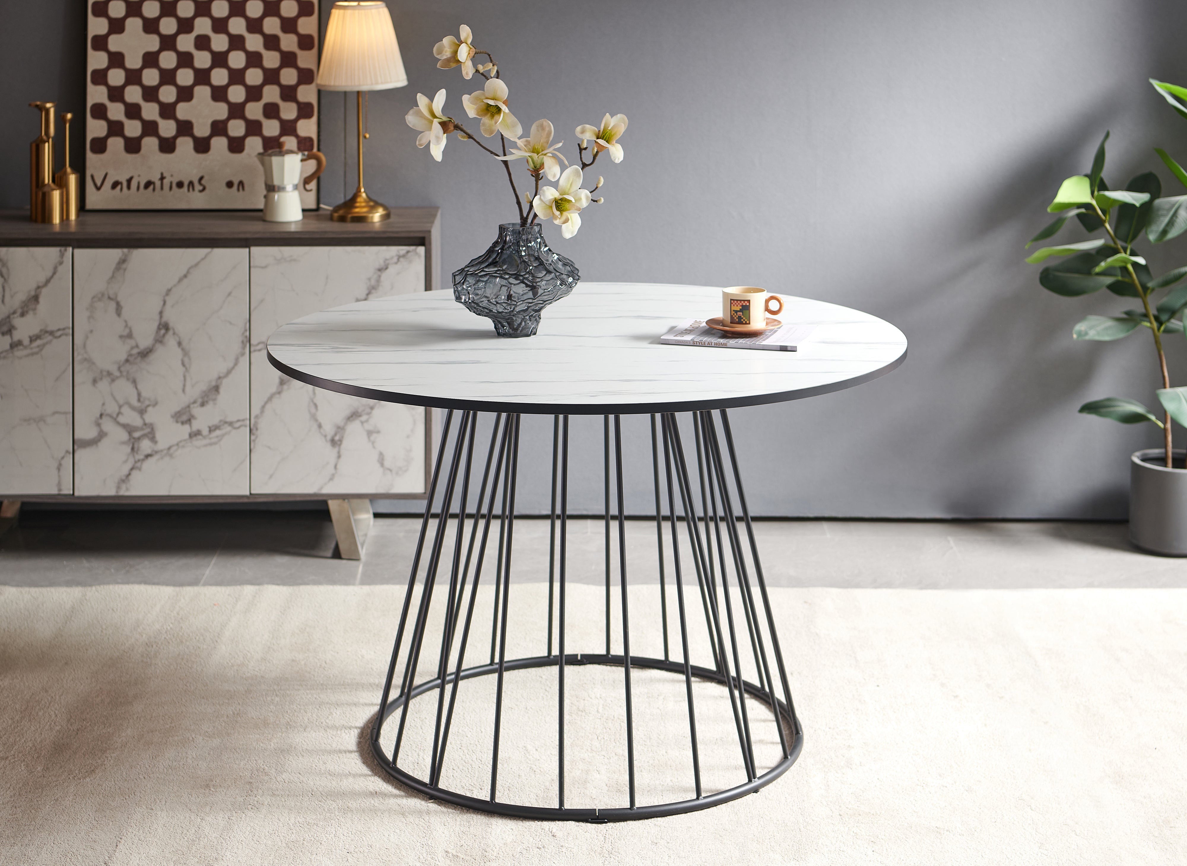 Table à manger ronde effet marbre blanc pied en métal noir STELLA