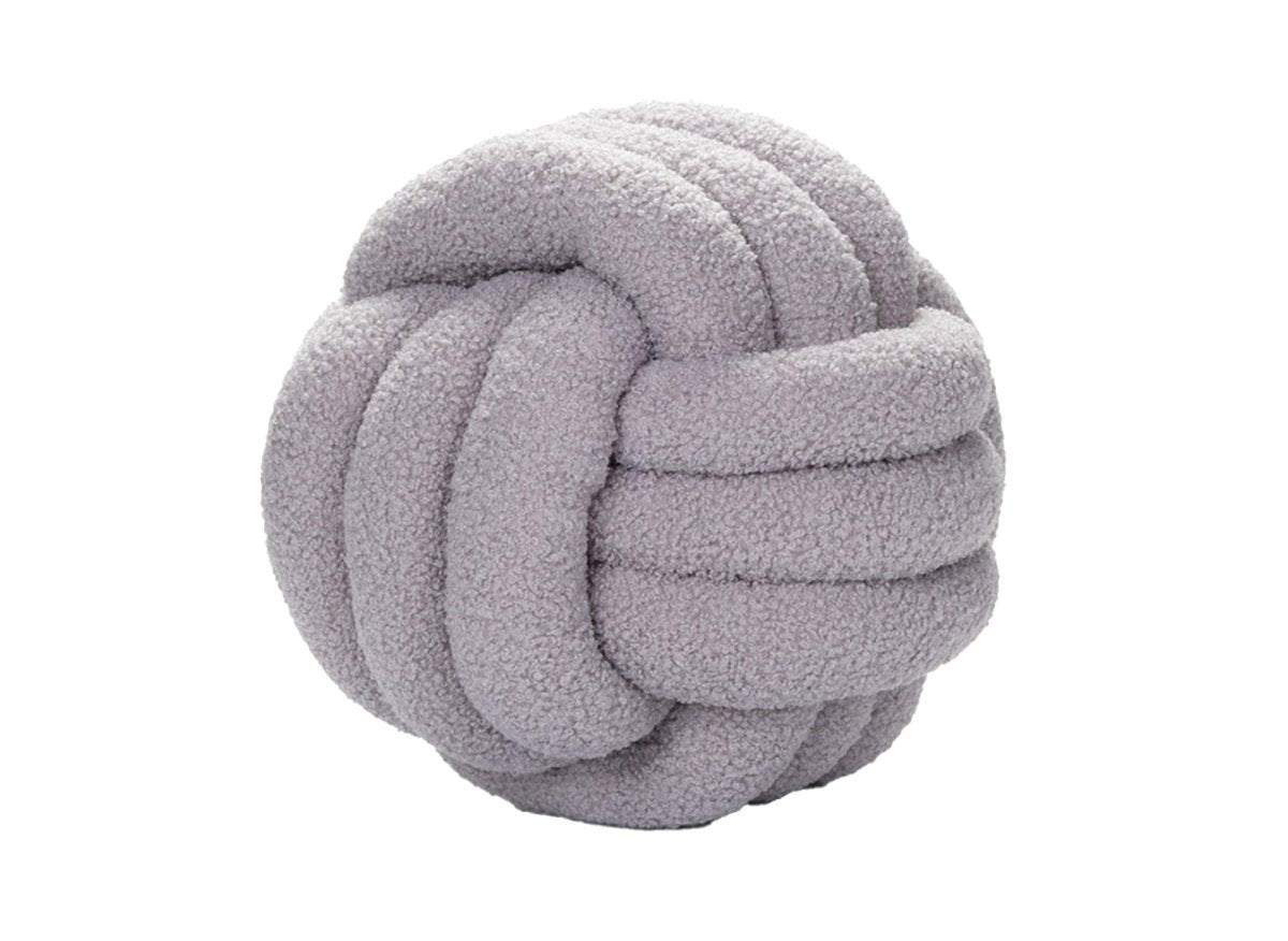 Coussin rond décoratif boule de nœud en effet peau de mouton gris clair NODUS - DécoInParis