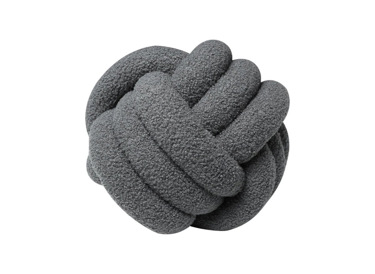 Coussin rond décoratif boule de nœud en effet peau de mouton gris foncé NODUS - DécoInParis
